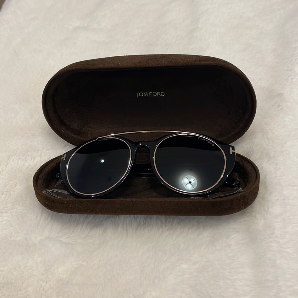 Tom Ford sunglasses.